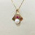 Pearl ruby pendant necklace featuring 0.08tcw rubies and a classic pearl, crafted in matte finish 14kt yellow gold Treasured & Co.
