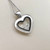 Treasured & Co. 14kt white gold necklace showcasing a diamond heart pendant with 0.43tcw moving diamonds for a dynamic sparkle.