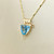 Stunning 14kt gold necklace with a unique 2.08tcw trillion-cut blue topaz pendant, designed for her Treasured & Co.