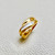 Elegant 14kt yellow gold diamond band featuring tapered baguette diamonds totaling 0.30tcw, a unique design for a timeless look Treasured & Co.