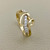 Timeless 14kt yellow gold heart ring with 0.16tcw diamonds, designed with a unique curved heart shape for a special gift for her Treasured & Co.