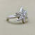 Treasured & Co. 14kt white gold flower ring with 0.21tcw diamonds, a delicate and meaningful gift for her.