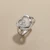 White gold diamond heart ring 0.15tcw in 14kt white gold with moving diamond design