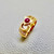 Unique cabochon ruby ring featuring 0.52tcw, accented with zirconias, designed as a simple vintage statement ring for women in 14kt gold Treasured & Co.