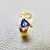14kt yellow gold trillion tanzanite ring with 0.41tcw, crafted as a unique and versatile piece, perfect for both men and women Treasured And Co.