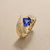 Tanzanite gold ring with diamond accents 14kt yellow gold detail
