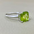 Treasured & Co. solitaire peridot white gold ring 1.92tcw, set in 14kt white gold. A unique engagement ring and statement piece for peridot birthstone lovers.
