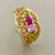 Unique peridot quartz ring 0.96tcw featuring peridot, ruby, and pink quartz birthstones, set in 14kt yellow gold. Vintage-style filigree design from Treasured & Co., Astoria.