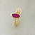 Marquise gold ring 0.60ct with lab-created ruby set on a filigree design, crafted in 14kt yellow gold. A unique ring for women by Treasured & Co., Astoria, New York.