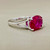 Beautiful 3.21ct oval ruby statement ring, set in a 14kt white gold cathedral setting. Lab-created ruby, a perfect statement piece for women from Treasured & Co., Astoria.