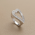 14kt white gold heart ring detail showing asymmetrical open heart design and pavé surface