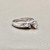 Bold marquise diamond engagement ring 0.40tcw, set in 14kt white gold with round and baguette diamonds. The 0.30ct marquise center diamond makes a statement in this unique design from Treasured & Co.