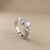 1.01ct round-cut diamond engagement ring in with baguettes setting — front view