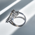 Platinum setting of three stone diamond engagement ring from Treasured & Co., Astoria. Platinum setting of three stone diamond engagement ring from Treasured & Co., Astoria.