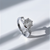 1.00 carat center round diamond, set in platinum three-stone engagement ring setting. 1.00 carat center round diamond, set in platinum three-stone engagement ring setting.