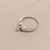 Channel set diamond engagement ring dainty tapering band 14kt white gold side profile