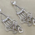 Beautiful fashion dangling hearts earrings, made with 14kt white gold. A bold and unique statement piece by Treasured & Co., Astoria.