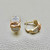 Elegant fashion gold zirconia earrings 0.60tcw, designed with unique hoops in 14kt rose, white, and yellow gold, and 11mm inner diameter. A beautiful earring set by Treasured & Co.