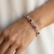 Oval natural ruby and diamond bracelet 14kt white gold close-up