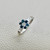0.61tcw diamond engagement ring in cluster setting — gallery view