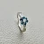 0.61tcw diamond engagement ring in cluster setting — front view