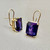 This pair of emerald cut amethyst earrings 10.00tcw features amethyst stones set in 14kt yellow gold, designed with clip-back closures. A one of a kind piece for women by Treasured & Co., Astoria.