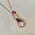 Stunning Ametrine and Tourmaline pendant necklace 4.34tcw, featuring pear-shaped pink tourmaline, oval-cut green tourmaline, and teardrop ametrine, set in 14kt yellow gold. A unique and luxurious design for women by Treasured & Co., Astoria.