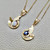 Timeless wave pendant necklace 0.35-0.56tcw, set with an oval Madagascar sapphire or cabochon opal, designed in 14kt yellow gold. A unique and luxurious design by Treasured & Co., Astoria, New York.