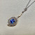 Vintage tanzanite pearl necklace 14kt white gold lifestyle shot