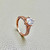 Stunning unique promise ring 2.10tcw, crafted in 14kt rose gold. A one of a kind design thats affordable and perfect for a promise or engagement ring by Treasured & Co., Astoria.