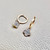 Elegant four-leaf clover diamond dangling earring 0.25tcw, featuring diamonds set in 14kt gold. A stylish design for women by Treasured & Co.
