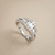 0.76tcw round-cut diamond engagement ring in with baguettes setting — front view