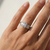 0.76tcw round-cut diamond engagement ring in with baguettes setting — gallery view