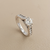 1.00tcw round-cut diamond engagement ring in channel-set setting — three-quarter angle