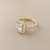 2.34tcw radiant-cut diamond engagement ring in halo setting — three-quarter angle (3)