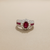 Art deco style vintage ruby ring, macro close-up of 1.30ct oval ruby and diamond halo