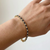 Round natural sapphire and diamond tennis bracelet 14kt yellow gold close-up