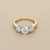 Three stone diamond engagement ring round cut natural 0.45ct center two tone gold front