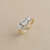 Three stone round diamond ring natural G/H SI1/SI2 two tone gold 0.77tcw close-up