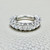 Elegant EFG Color 5mm Oval Diamond Band in a VS/VVS Quality 14kt Setting.