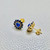 Exquisite Yellow Gold Earrings Featuring Cabochon Tanzanite and Sapphire Halo