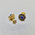 Custom tanzanite halo studs 14kt yellow gold gift presentation