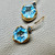 Swiss blue topaz diamond earrings hexagonal cut 12.50ct 14kt yellow gold detail