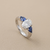 1.70tcw oval-cut sapphire engagement ring in three-stone setting — top view