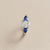 1.70tcw oval-cut sapphire engagement ring in three-stone setting — side profile