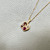 Tanzanite ruby diamond necklace on 18 inch box chain 14kt yellow gold