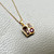 Tanzanite ruby and diamond pendant necklace 14kt yellow gold front view