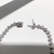 Open box clasp detail on 14 kt white gold diamond bracelet