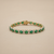 Emerald halo tennis bracelet 14kt yellow gold profile