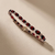 Garnet diamond tennis bracelet 14kt yellow gold side profile